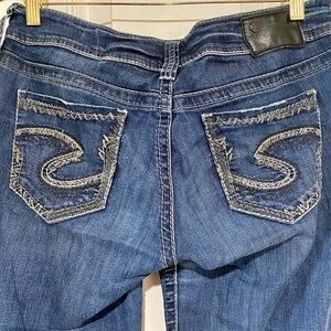 Silver Suki Jeans Dark Blue Boot Cut Jeans with Embroidered Pockets
